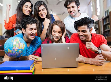 Indian Group College Students Laptop Study In Classroom Education