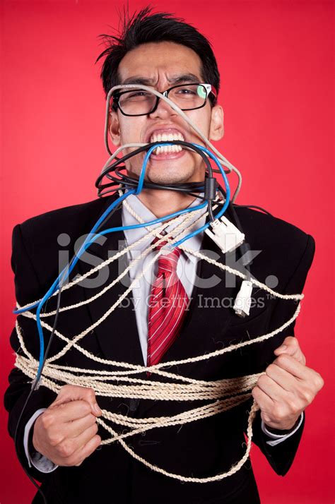 Angry Businessman All Tied Up Stock Photo Royalty Free Freeimages