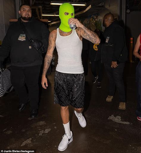 Justin Bieber Has Fun Backstage As He Wears A Neon Green Ski Mask Alongside Wife Hailey Daily
