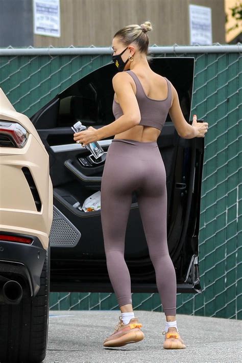Hailey Bieber Displays Her Toned Figure In A Crop Top And Leggings While Stopping By A Medical