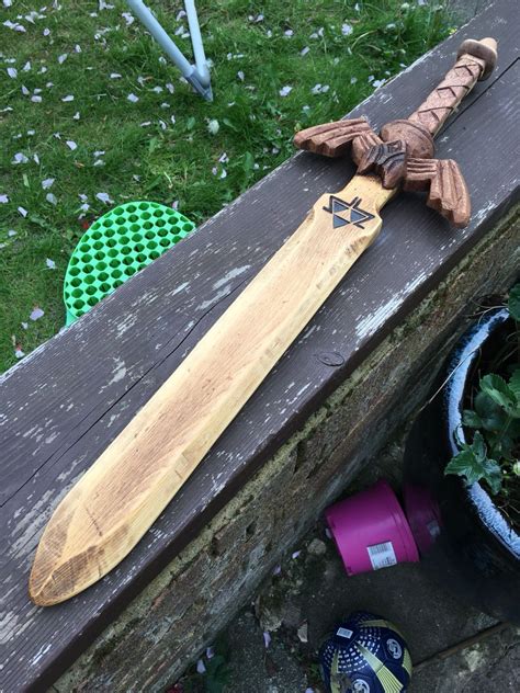 a wooden sword i made for a friends son based on the legend of zelda skyward sword made from
