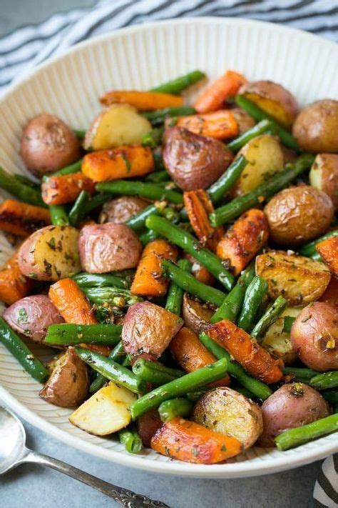 Bake an additional 20 minutes until potatoes are tender and cooked through. Garlic Herb Roasted Potatoes Carrots and Green Beans (With ...