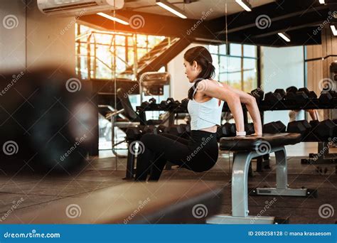 Young Asian Woman Doing Push Ups In The Gym Stock Photo Image Of