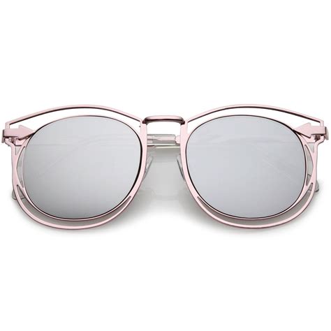 oversize open metal horn rimmed sunglasses with arrow design and round mirror mirrored lens