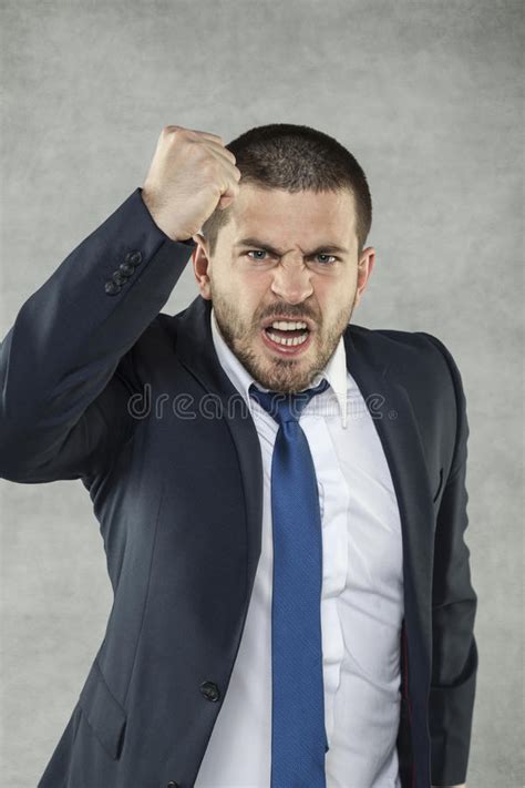 Young Businessman Shouting And Threatens Fist Stock Photo Image Of