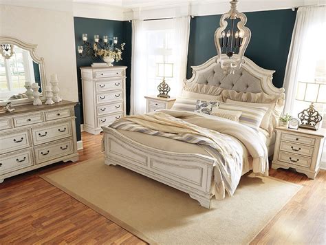 The staple of every bedroom set is a bed that sets the style for the whole ensemble. Realyn Panel Bedroom Set by Signature Design by Ashley ...