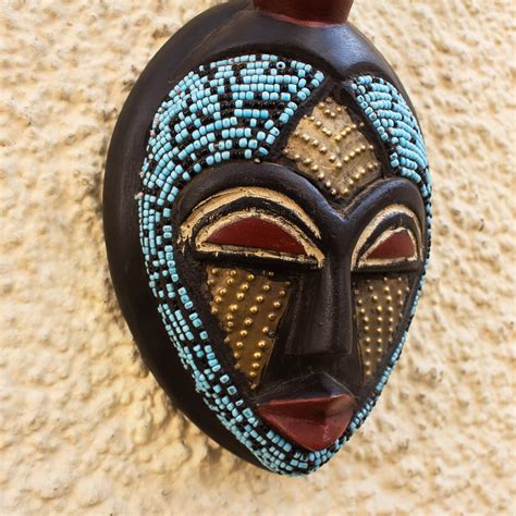 Hand Carved African Wood Mask With Brass And Glass Accents Ato Novica