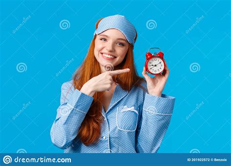 Dont Forget Wake Up On Time Cheerful And Cute Relaxed Feminine Redhead Woman In Pyjama And