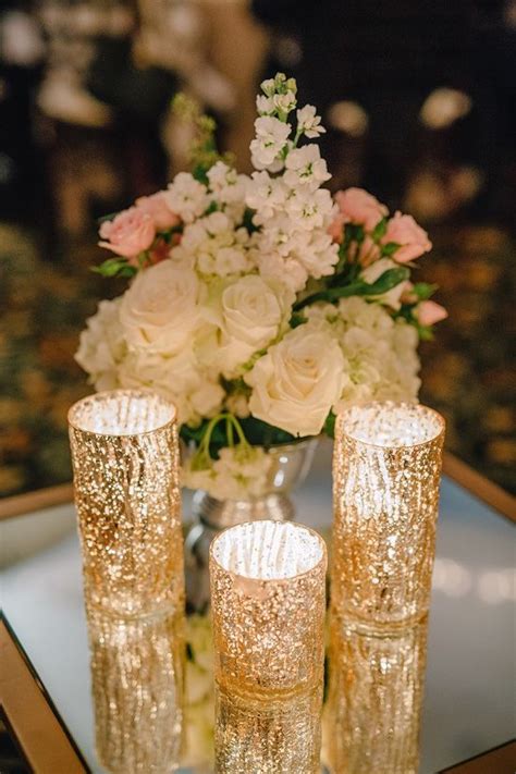 The unique colors range from transparent, silver, gold, copper, and black. 10 Ways to Use Candles at Winter Weddings - mywedding ...