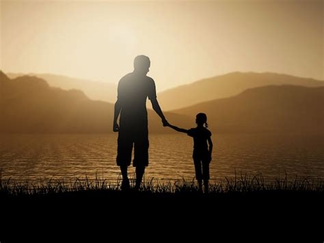 Silueta 3d De Padre E Hija Contra Un Paisaje De Mar Al Atardecer Foto