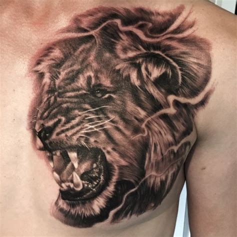 Broad shoulders and backs are one of the best places on the body of a man to have a lion tattoo designs! LionHeart #lion #tattoo | Body art tattoos, Tattoos ...