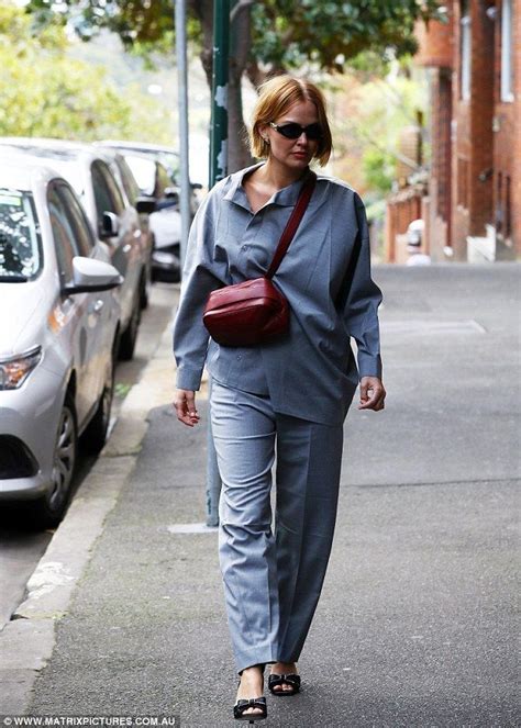 Happy To Be Home Lara Bingle Looks Downcast After Arriving In Sydney