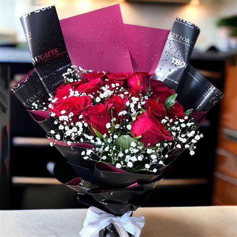 12 Red Roses Black Wrap Bouquet Online Ts To Nepal Tmandu