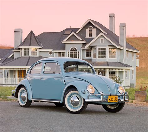 1957 Volkswagen Beetle Light Blue 34 Front View On Pavement By House