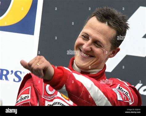 Dpa German Formula One Driver Michael Schumacher Of Ferrari Gives A