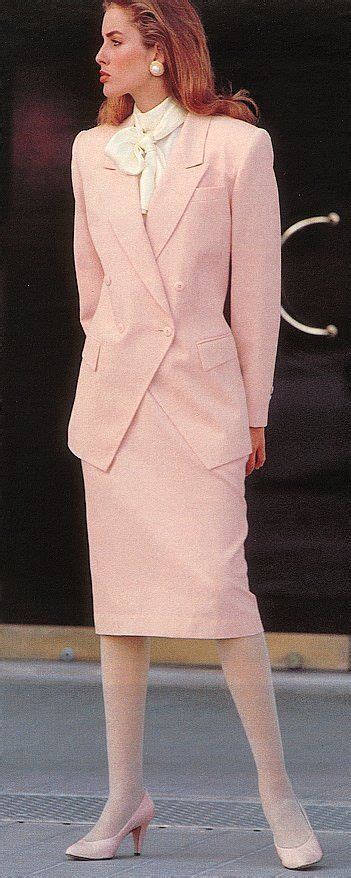 The Power Suit In The 80s With A Feminine Touch Note The Pink Hose