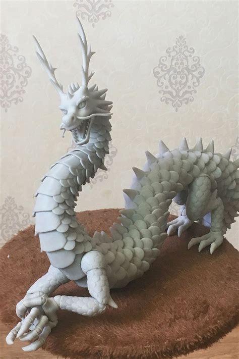 The Process Of Creating A Chinese Dragon From Polymer Clay Sculpture