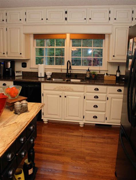 A small peninsula helps to create a spacious look to the kitchen. Kitchen Cabinets Clearance - HomesFeed