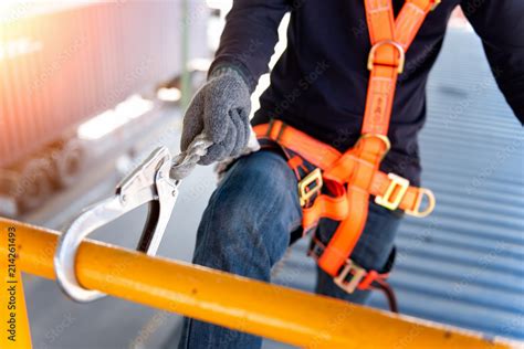 Construction Worker Use Safety Harness And Safety Line Working On A New Construction Site