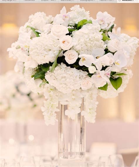 Close Up White And Glass White Wedding Flowers Centerpieces Pink