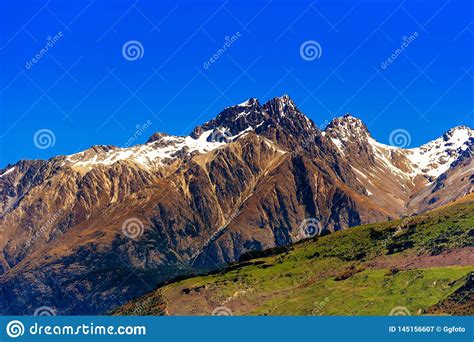 Mountain Landscape Of The Southern Alps New Zealand Isolated On Blue