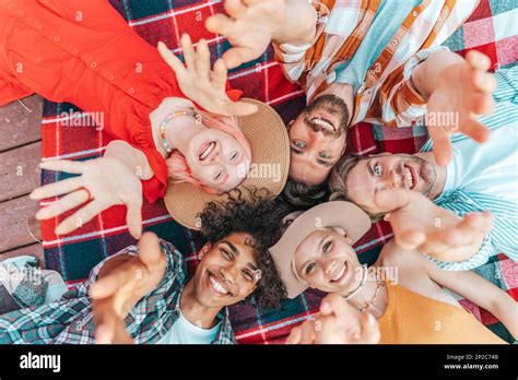 Group Of Friend Relax Together Lying Down In Summer Stock Photo Alamy