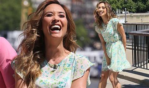 Myleene Klass Holds On To Her Dress As The Wind Gets The Better Of Her