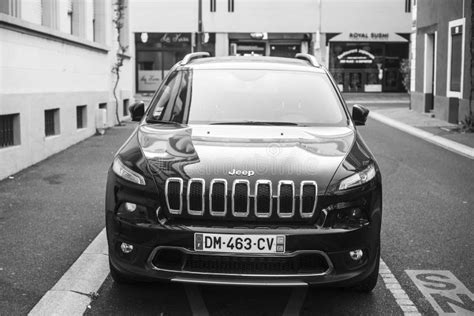 Front View Of Black Jeep Cherokee Parked In The Street Editorial Stock