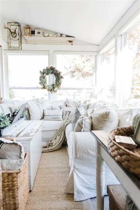 Lanterns are a timeless way to add style and ambiance to your home. Cozy Farmhouse Fall Sunroom - Liz Marie Blog