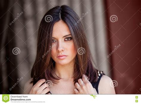 Portrait Of Fashion Model Girl On The Industrial Background Stock