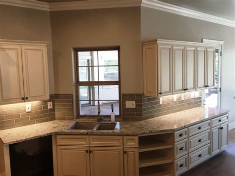 If you want a brighter unused stark white look, you can update the look of soft maple cabinets with old white paint. Antique White Maple Glazed Kitchen Cabinets