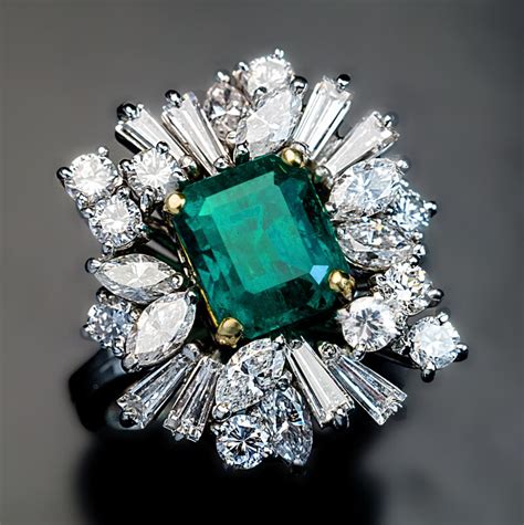Vintage Asymmetrical Design Emerald Diamond Engagement