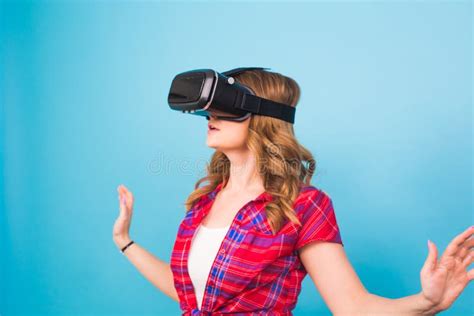 technology virtual reality entertainment and people concept woman with virtual reality