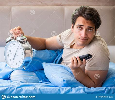 Man Having Trouble With His Sleep Stock Photo Image Of Clock Awake
