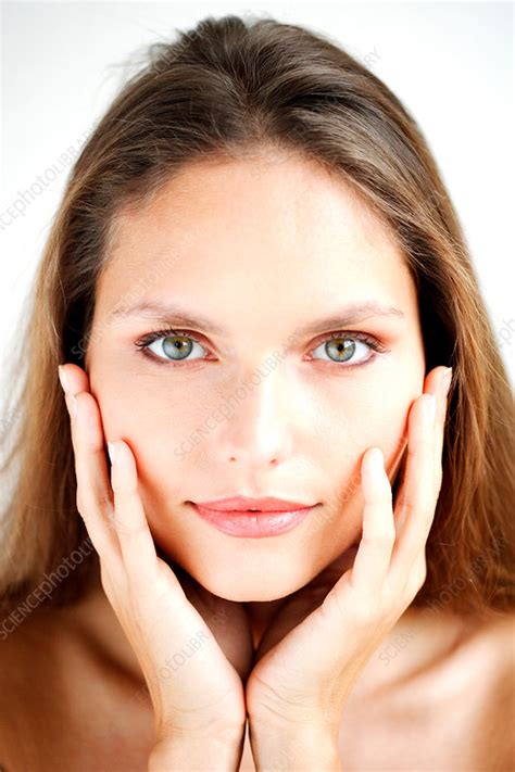Woman With Hands On Her Face Stock Image C Science Photo Library