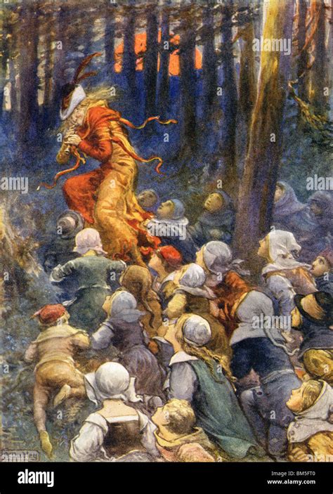 The Pied Piper Leading The Children Away From The Town Stock Photo Alamy