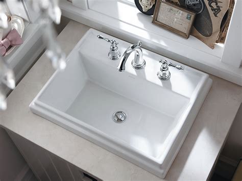 Purist® widespread bathroom sink faucet with low lever handles and low gooseneck spout. KOHLER | 2991-8 | Tresham rectangular drop-in bathroom ...