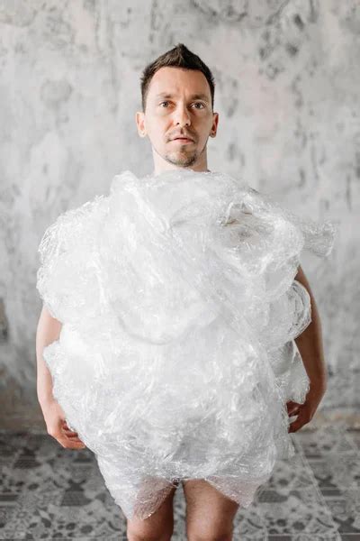 Naked Freak Man Wrapped Packaging Film Holding Air Balloons Hands Stock Photo By Nomadsoul