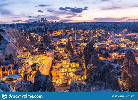 Night View Of Goreme Town With Cave Hotel Built In Rock Formation In