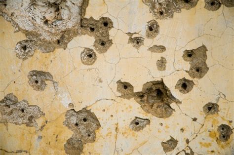 Wall With Bullet Holes Stock Photo Download Image Now Istock