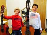 Photos of Group Guitar Lessons For Kids