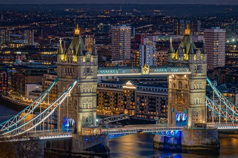 Tower Bridge Seen At Night In London Photograph By George Afostovremea