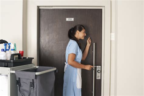 Female Maid Knocking On A Hotel Room Door Free Photo Download Freeimages