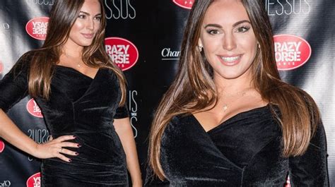 Kelly Brook Shows Off Her Voluptuous Curves In Plunging Velvet Dress In