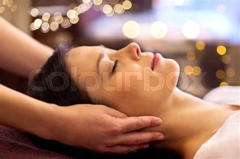 Woman Having Face And Head Massage At Spa Stock Image Colourbox