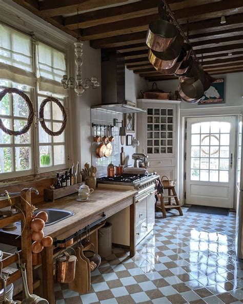 French Country Kitchen With Checkered Floor Tile Via Catinfrance