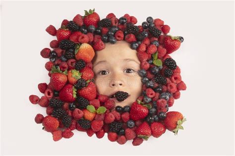 Healthy Vitamins Fruits Berries With Kids Face Close Up Top View Of