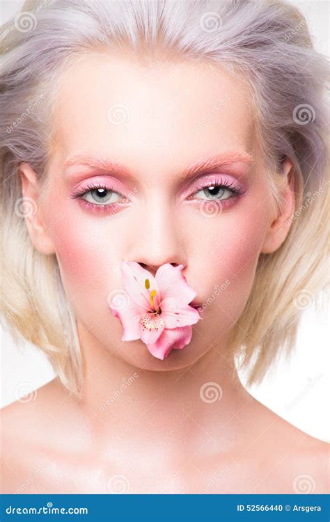 Beauty Portrait Of Model With Flower In Her Mouth Stock Photo Image