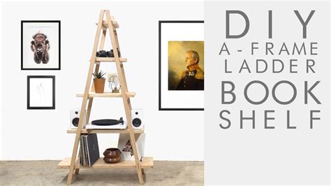 Cut two of the planks to 73 ½, and set them horizontally on a level surface. DIY A-Frame Ladder Bookshelf | Modern Builds | EP. 62 ...