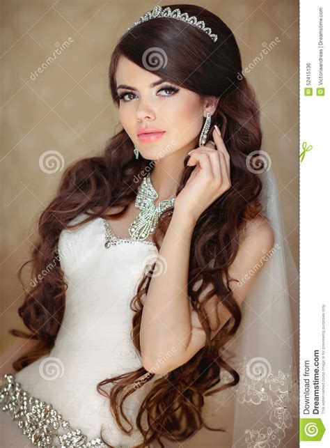 Get some wispy layers and a platinum blonde hair color, and you'll get a 49. Portrait Of Beautiful Brunette Bride With Long Wavy Hair ...